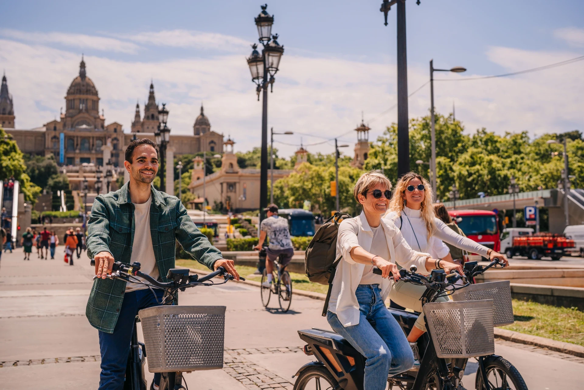 Explore Barcelona in one day combining cycling routes, a sailing experience, and Montjuïc cable car views