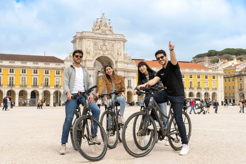 Private Tour: Lisbon 360: Bike Riding, Helicopter Flight & Boat Trip
